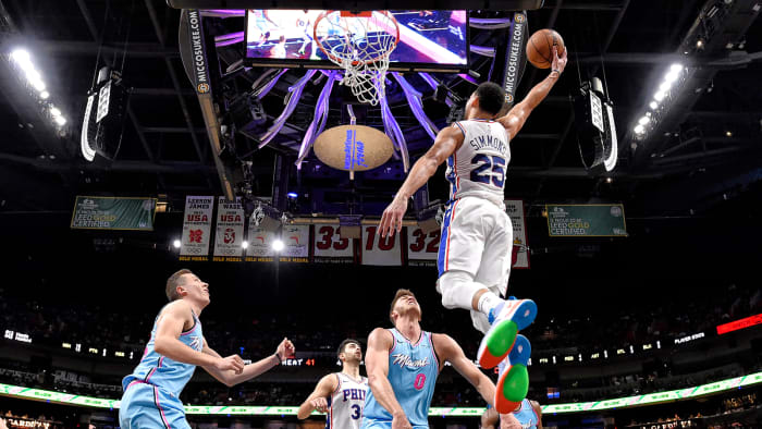 Ben Simmons soars for a dunk